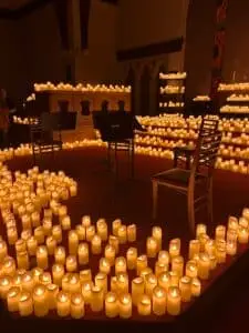 Candles on stage in cozy setting